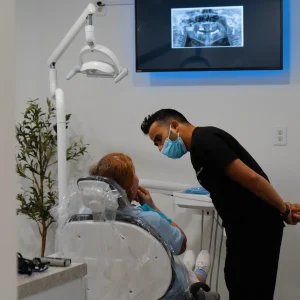 Bliss Dental Center office and team St. Charles IL